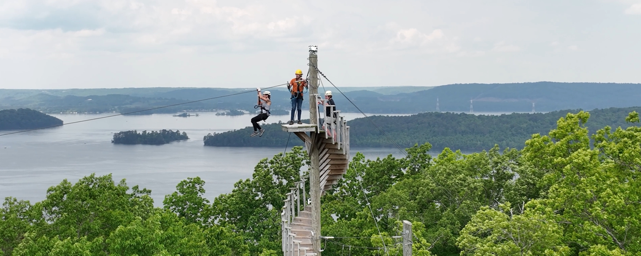 Woman on aerial adventure park tower